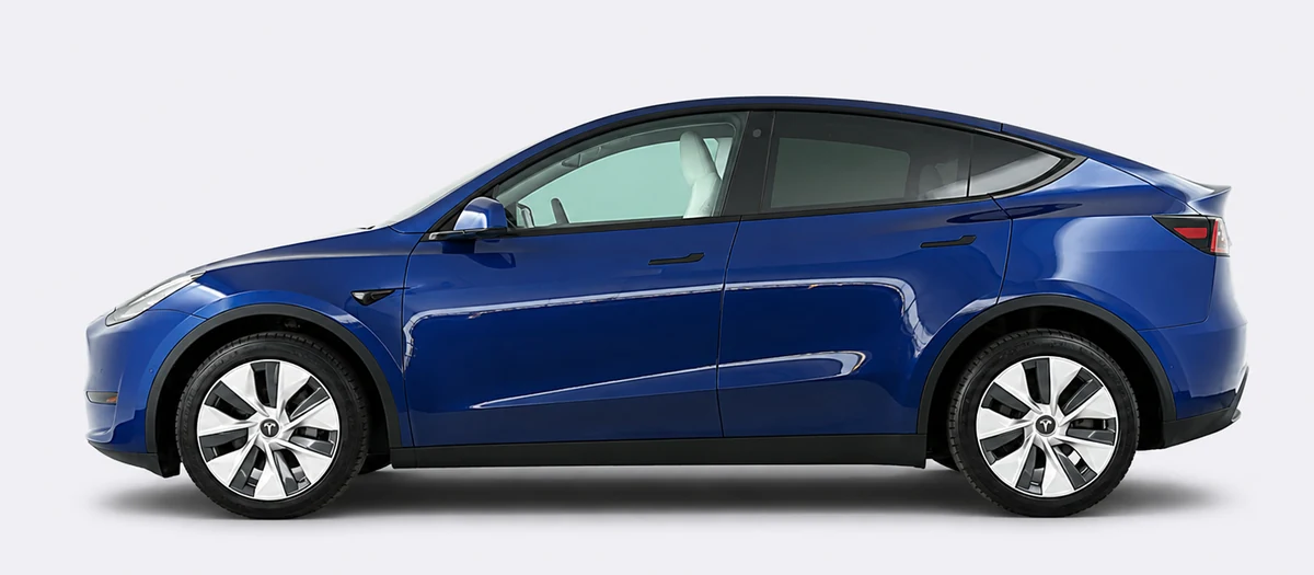 Tesla Model Y shown side-on facing left